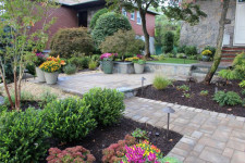 Hicks designed front entry with Fall Planters