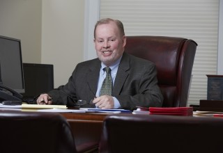 Michael J. Walsh, Esq. of Walsh Woodard, LLC.