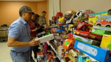 Dr. Norman Quintero collecting Toys for Children in Puerto Rico