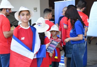 Fans with copies of the Youth for Human Rights booklet