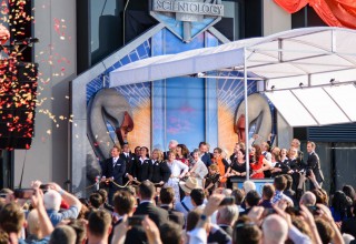 Pulling down the ribbon to open the Church