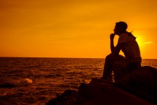 Woman Sitting Alone Thinking About Climate Change