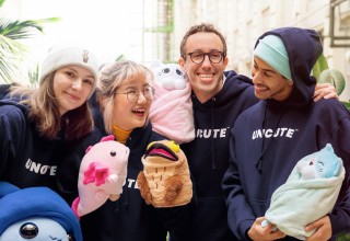 Uncute Initiative volunteers, with co-founder Zack Buchman, and artist Sarula Bau