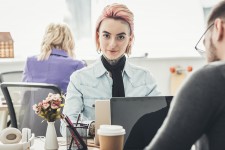 Bright Eyed, Pink Haired, and Tattooed Office Employee