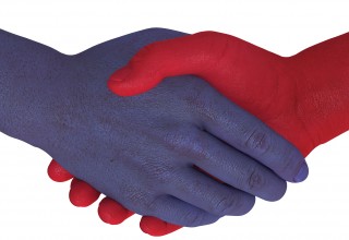 Red and Blue Hands Shaking