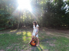 Just A Vessel & Her Guitar