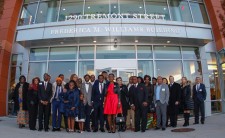 Frederica Williams (center in red), CEO and President of Whittier Street Health Center at building dedication 2018 