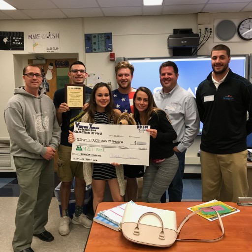 Educators of America and Grand Island High School Yearbook Class Donates Computer Lab