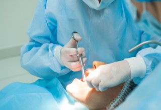 Dentist Working on a Patient