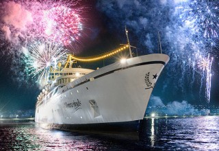 Departing from Bridgetown, Barbados, with a fireworks farewell.