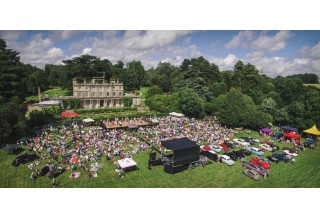 Thousands attend the annual Summertime Swing charity concert, featuring great music, refreshments, dancing, a vintage car show, and an afternoon of fun for the entire family.