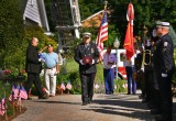 Fire Chief Carries Box with Unclaimed Ashes of Veteran