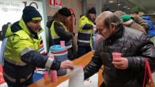 PRO.CIVI.CO.S. helping at a relief station at the Porta Nuova metro station in Torino, Italy.