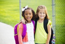 Two Girls Heading to School