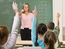 Smiling Teacher in Classroom