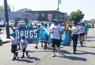 The Foundation for a Drug-Free World and the Lifesavers youth group marched in Buffalo's University District Parade