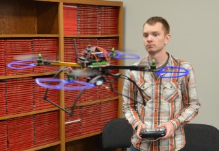 Team member flying drone