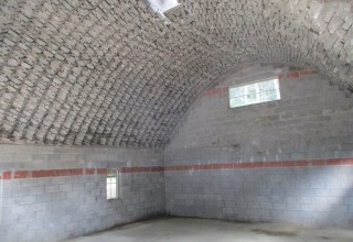 Vaulted masonry arch interior view