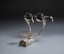 SNOW GOGGLES ON ANTLER STAND