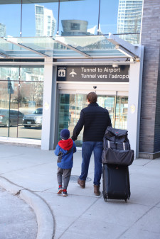 Wil (founder) and son with Liambro Carrier at the Airport