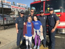 Youth for Human Rights volunteers with members of the LA Fire Department at the Martin Luther King Day parade