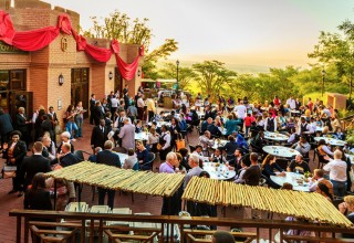 GUESTS GATHER for an evening of rhythm and dance.