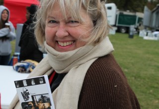 Volunteer shares The Way to Happiness with those attending PeaceFest 2017