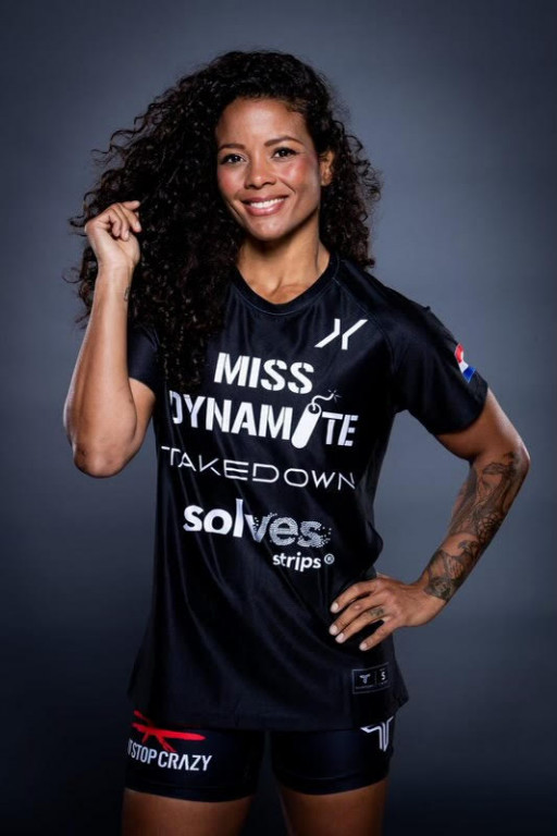 Solves Strips® in 'Miss Dynamite' Denise Kielholtz's Corner for Title Fight