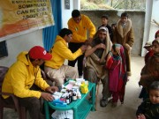 Pakistan Volunteer Assist Team providing medical care in remote village, stranded by the earthquake. 