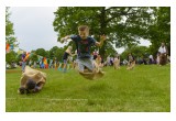 Jumping across the sack race finish line at Saint Hill