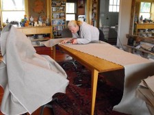 Outgrowing her dining table