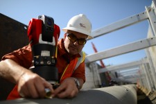 API Laser Tracker in use by Exact Laser technician measuring pipeline installation