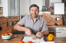 Happy Guy Cooking Alone