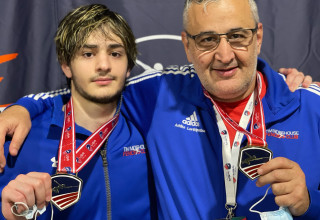 Nickoloz Lortikipanidze and Coach Archil Lortikipanidze