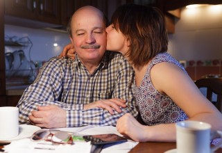 Daughter Thanking Father for Helping with Loans