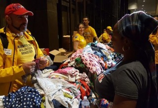 Scientology Volunteer Ministers helping people displaced by Hurricane Harvey at Houston's Lakewood Church