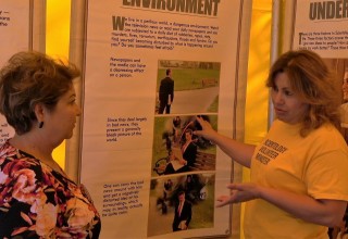 Trained Volunteer Minister provides help inside the tent.