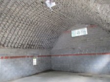 Vaulted masonry arch interior view