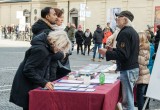 Visitors to the booth left with copies of the What are Human Rights? booklet and signed a petition calling on the country to mandate human rights education.