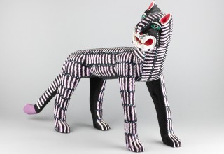 Black cat with white and purple stripes, Margarito Melchor, Maria Teresa Santiago, San Martin Tilcajete, 1987, courtesy of Tucson Museum of Art. 