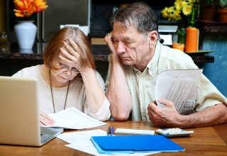 Senior Couple Looking at Finances