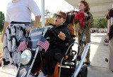 "Harley dude" Timmy rides by for the Codington/101 Mobility parade.