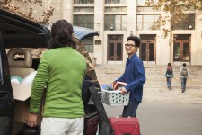 College Student Moving into Dormitory