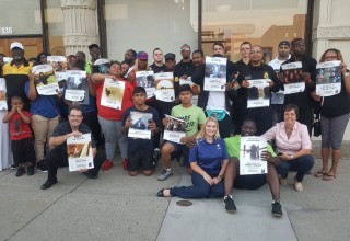 Group photo outside the Church of Scientology Buffalo used in social media to promote International Peace Day and the actions Buffalo groups are taking to create peace in the community 