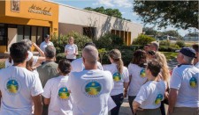 Volunteers gather at the North Greenwood Martin Luther King Community Center to launch a community cleanup.