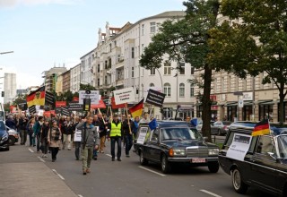 CCHR members marched to raise awareness of the danger of psychiatry at the annual WPA Congress. Six hearses symbolized the thousands who died at the hands of psychiatry over the past year.