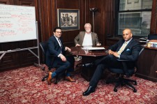 Abe George and Colleagues in His Office 