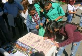 One of the many petition drives collecting signatures calling for the government to enforce the Universal Declaration of Human Rights