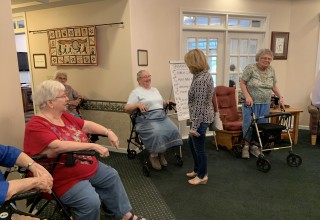 Stutzman greets residents during presidential trivia