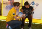 A Scientology Volunteer Minister provides one-on-one help to a local resident.